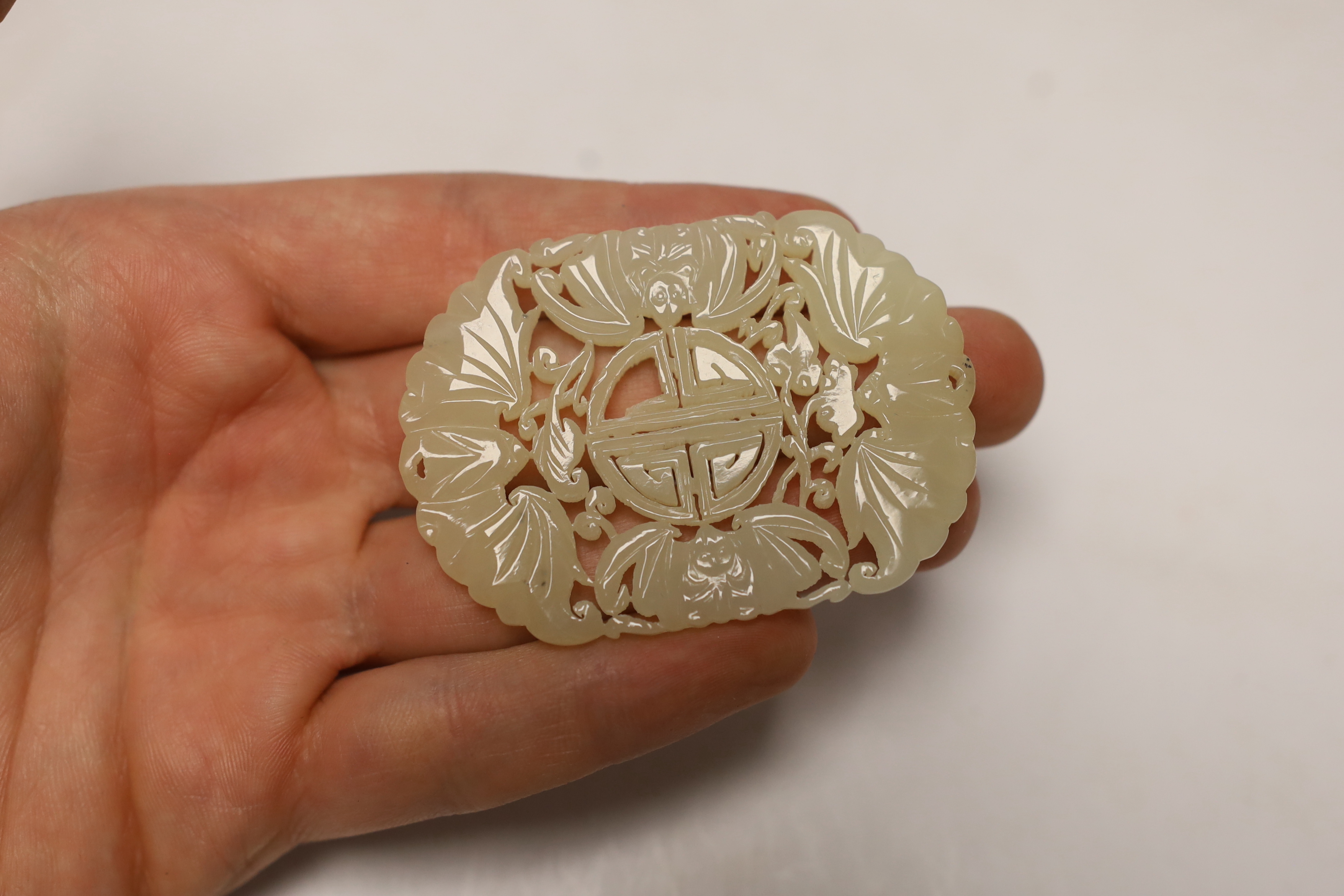 A Chinese jade plaque and a Chinese soapstone seal, 8.5cm